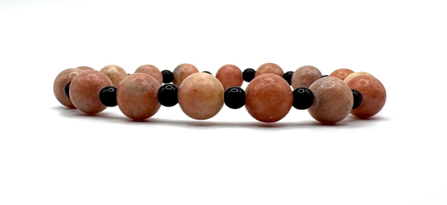 Orange Calcite & Black Beads Bracelet